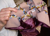 Flip your needlepoint pillow inside out.