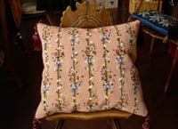 Finished needlepoint pillow or cushion.